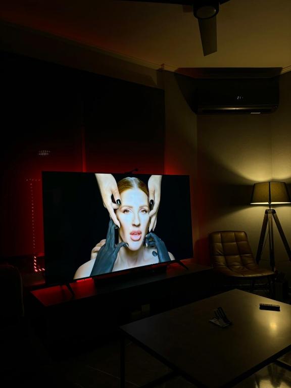 TV a/nebo společenská místnost v ubytování Sountou home