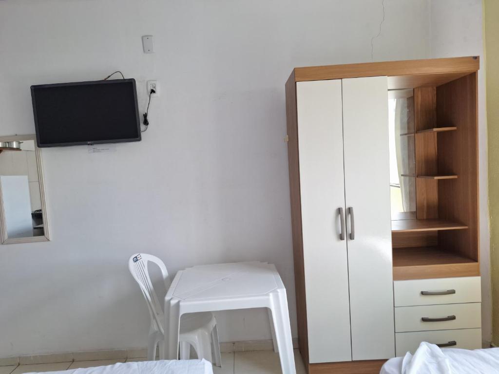 TV a/nebo společenská místnost v ubytování Residencial Dom Fernando