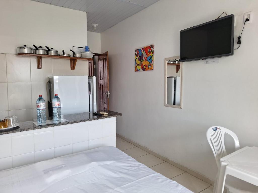 TV a/nebo společenská místnost v ubytování Residencial Dom Fernando