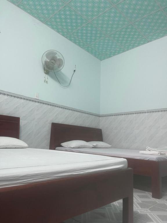Postel nebo postele na pokoji v ubytování Hotel Gia Hân