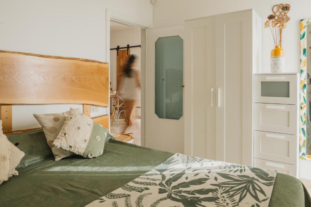A bed or beds in a room at Casa Tua - Sea View Onda
