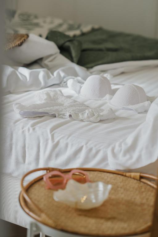 A bed or beds in a room at Casa Tua - Sea View Onda