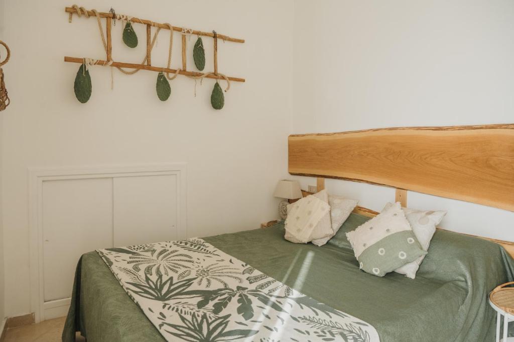 A bed or beds in a room at Casa Tua - Sea View Onda