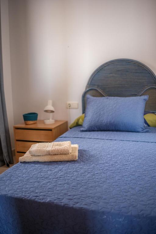 Posteľ alebo postele v izbe v ubytovaní Atico con Piscina en Ametlla de Mar