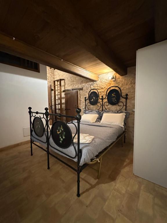 Postel nebo postele na pokoji v ubytování Spello Sant'Onofrio