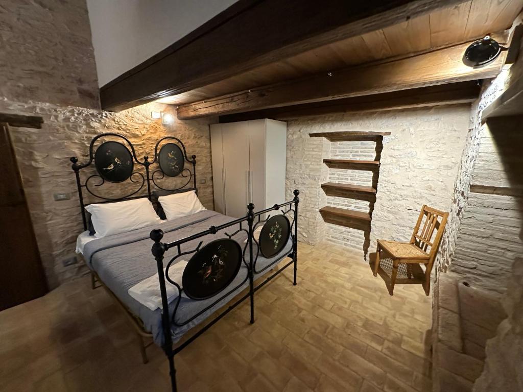 Postel nebo postele na pokoji v ubytování Spello Sant'Onofrio