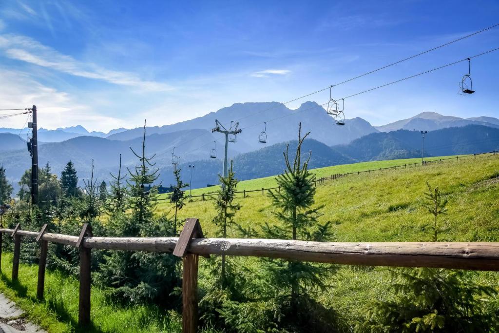 a view of a mountain with a ski lift at U Pabinów in Kościelisko