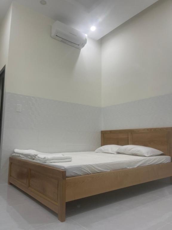 Postel nebo postele na pokoji v ubytování Hotel Gia Hân