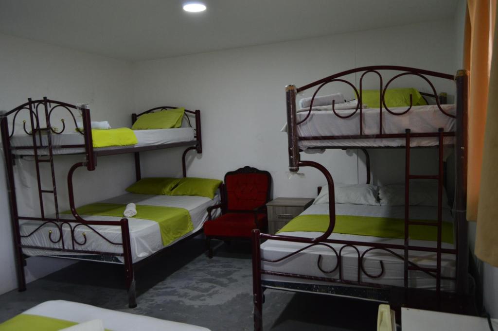 Postel nebo postele na pokoji v ubytování Hostal El Naufrago 1