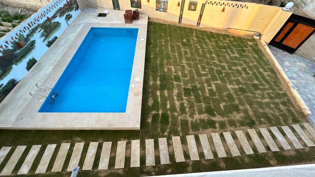 Bazén v ubytování فيلا جاكرندا تونس Jacaranda Villa Tunis nebo v jeho okolí