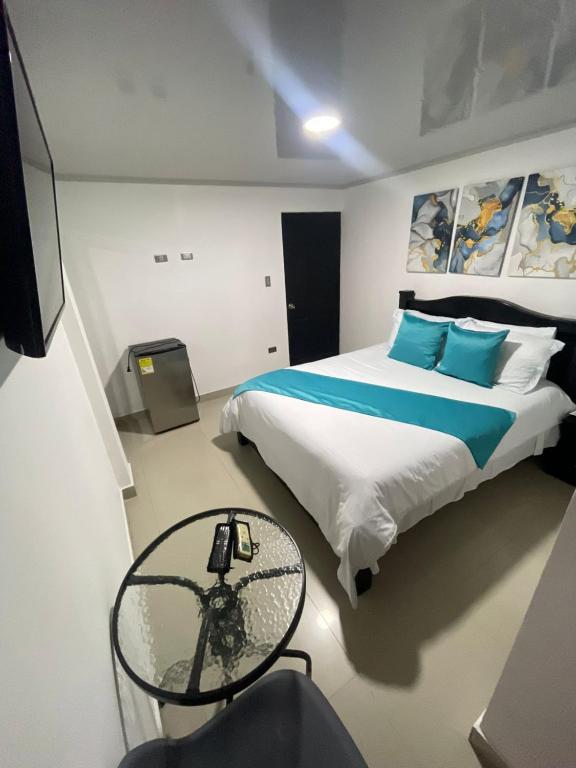 Postel nebo postele na pokoji v ubytování HOTEL LIGHT PLAZA