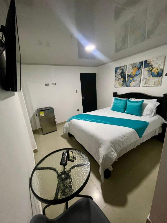 Postel nebo postele na pokoji v ubytování HOTEL LIGHT PLAZA