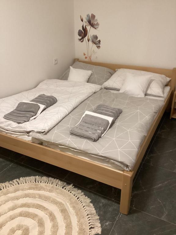 Postel nebo postele na pokoji v ubytování Apartmány Ořechovka Wellness