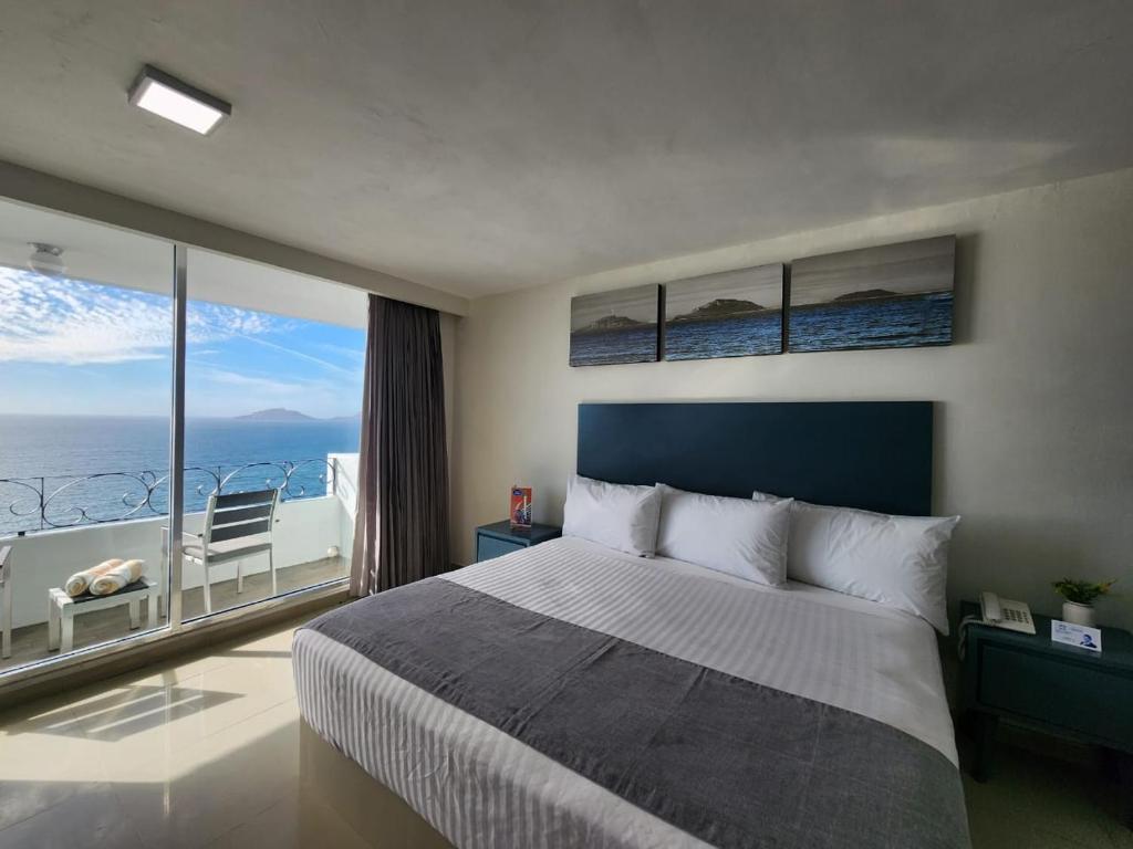 Cama o camas de una habitación en Hacienda Mazatlán sea view