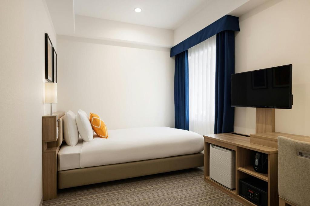 TV a/nebo společenská místnost v ubytování Four Points Flex by Sheraton Kobe Sannomiya