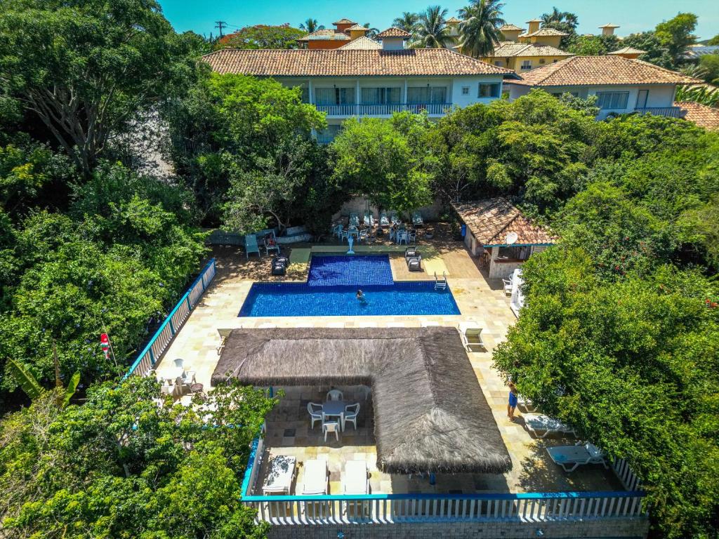 Bazén v ubytování Hotel Miratlantico Búzios nebo v jeho okolí