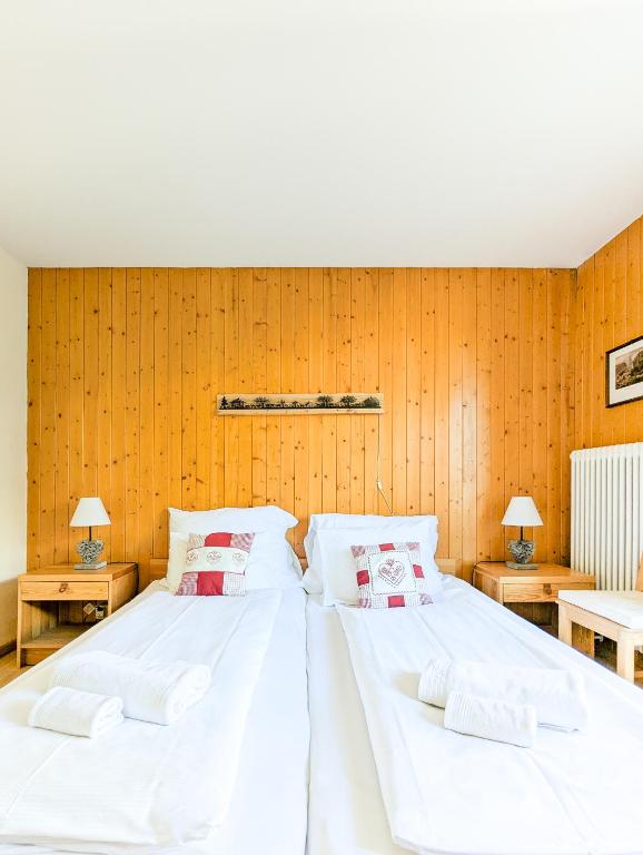 Postel nebo postele na pokoji v ubytování Center of Nendaz ! Apartment 3 rooms with balcony