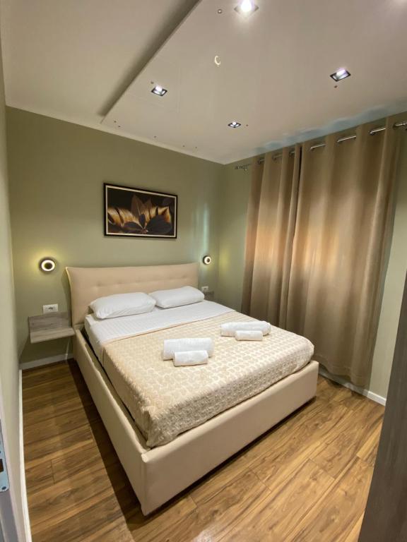 Postel nebo postele na pokoji v ubytování Novs Apartment3