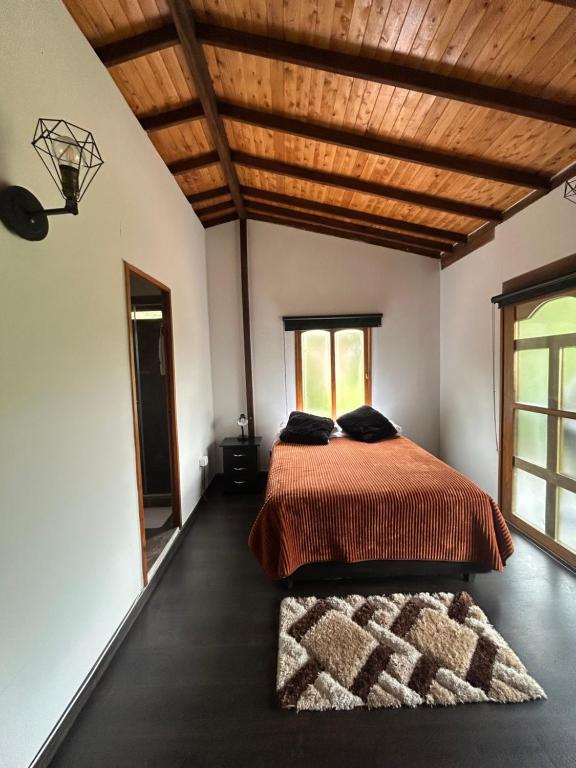 Postel nebo postele na pokoji v ubytování Forest House