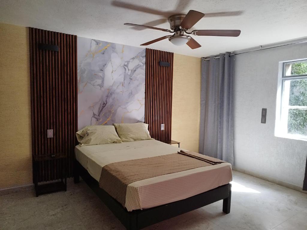 Postel nebo postele na pokoji v ubytování HOTEL SOL