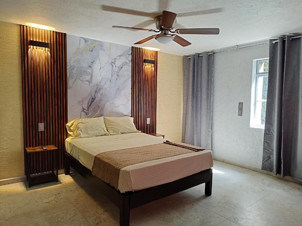 Postel nebo postele na pokoji v ubytování HOTEL SOL