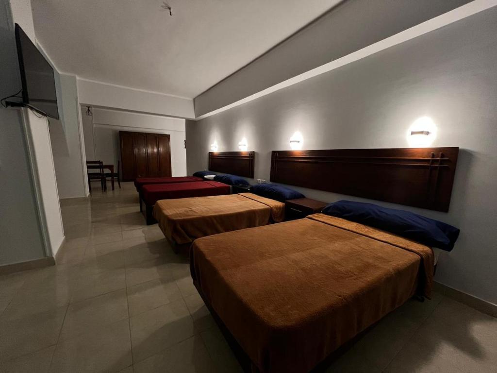 Postel nebo postele na pokoji v ubytování Hurghada Sea Apartments