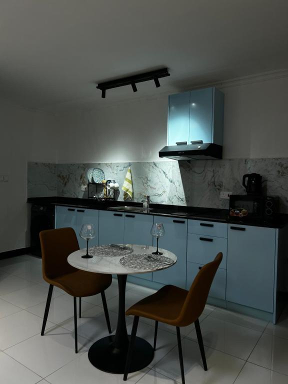 Η κουζίνα ή μικρή κουζίνα στο Stylish Apt At Mbezi Beach