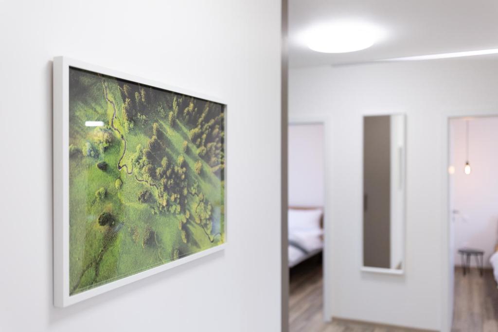 Postel nebo postele na pokoji v ubytování Apartmány u Josífka Velké Losiny