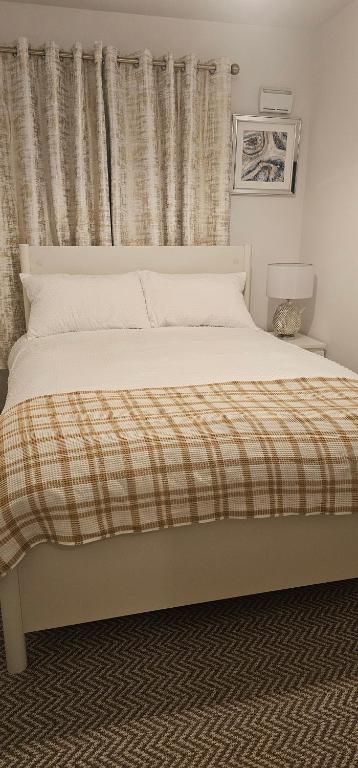Letto o letti in una camera di Abi's World - 23 Kilmartin Grove Green, Hollystown, Dublin 15