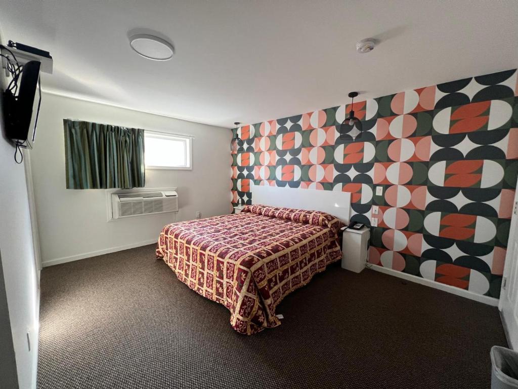 Postel nebo postele na pokoji v ubytování Winslow Motel