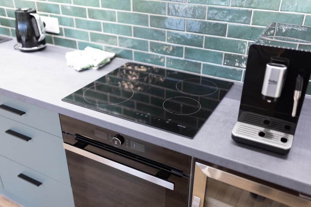 Kuchyň nebo kuchyňský kout v ubytování Apartmány u Josífka Velké Losiny