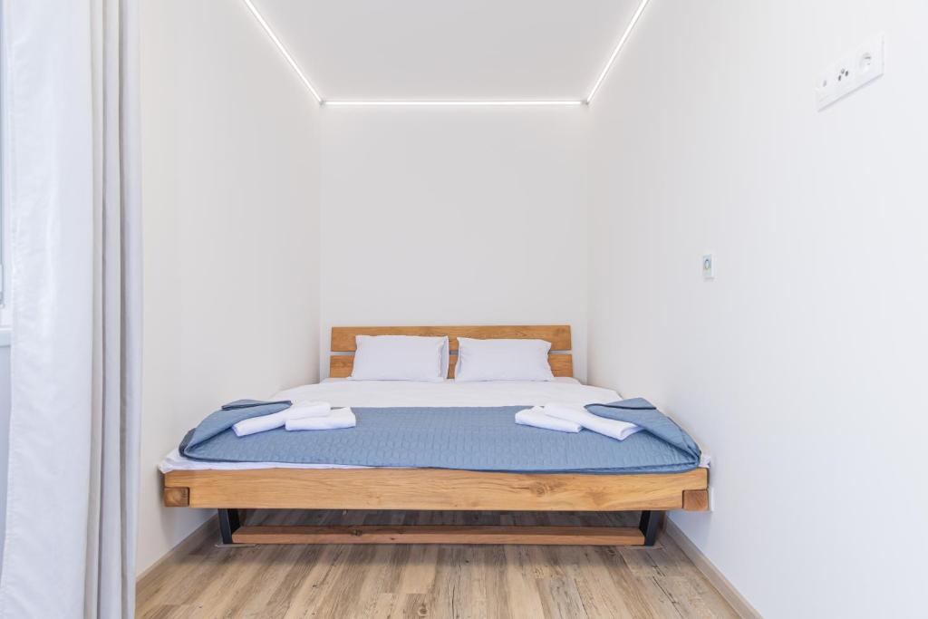 Postel nebo postele na pokoji v ubytování Apartmány u Josífka Velké Losiny