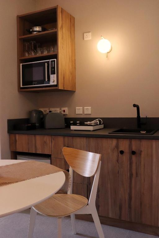 Kuchyň nebo kuchyňský kout v ubytování XV Studio Apartments - Rabat, Malta