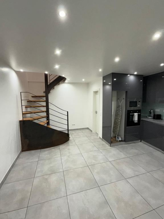 Kuchyň nebo kuchyňský kout v ubytování Chambre Centre Esch-sur-alzette
