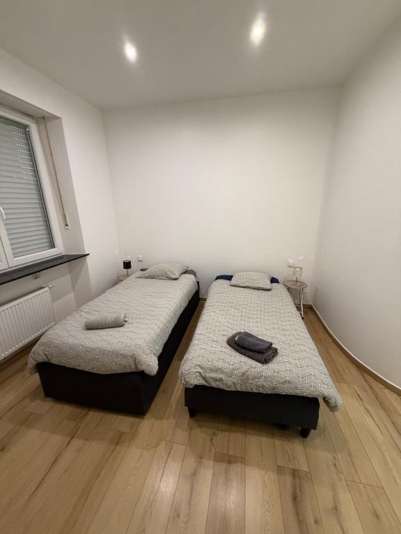 Postel nebo postele na pokoji v ubytování Chambre Centre Esch-sur-alzette