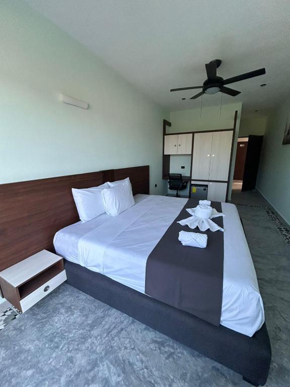 Postel nebo postele na pokoji v ubytování Hotel Mariel Holbox
