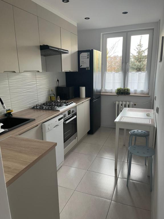 Kuchyňa alebo kuchynka v ubytovaní Apartament Centrum