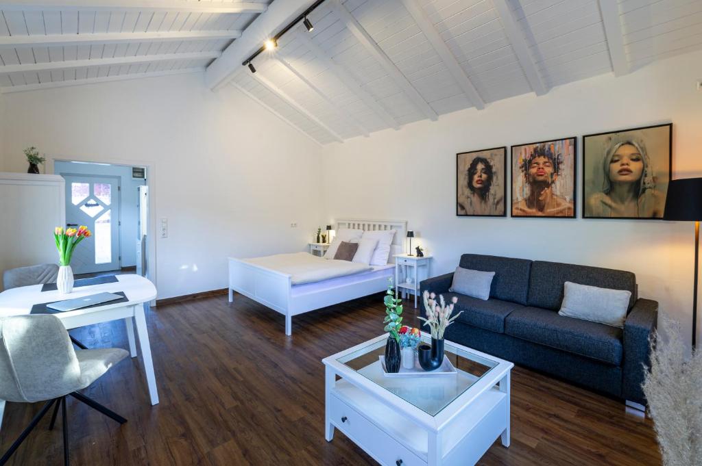 En eller flere senge i et værelse på Ferienwohnung B2