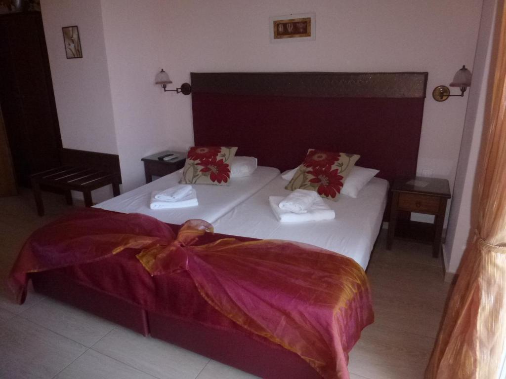 Postel nebo postele na pokoji v ubytování Galini Sea Apartments