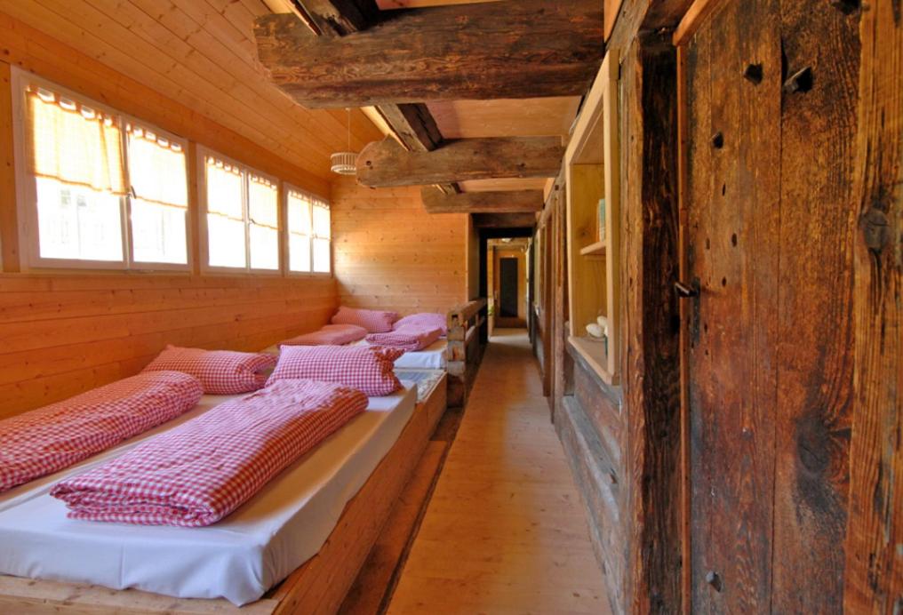 Postel nebo postele na pokoji v ubytování Stollenbacher Hütte auf 1092m