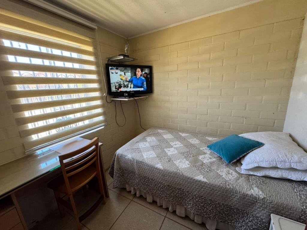 Postel nebo postele na pokoji v ubytování La Casita