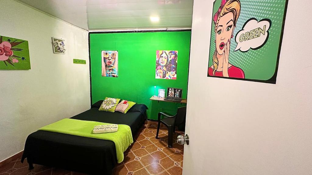 Postel nebo postele na pokoji v ubytování Casa Egos Pop Laureles