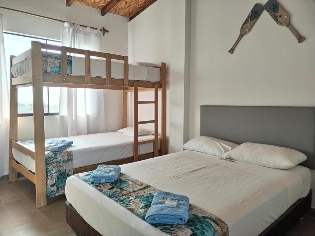 Postel nebo postele na pokoji v ubytování LIOMS HOME