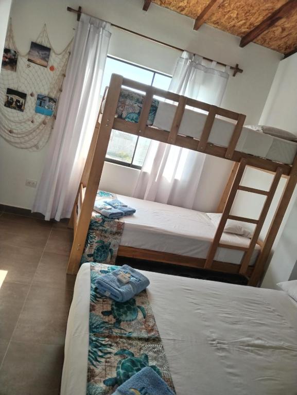 Postel nebo postele na pokoji v ubytování LIOMS HOME