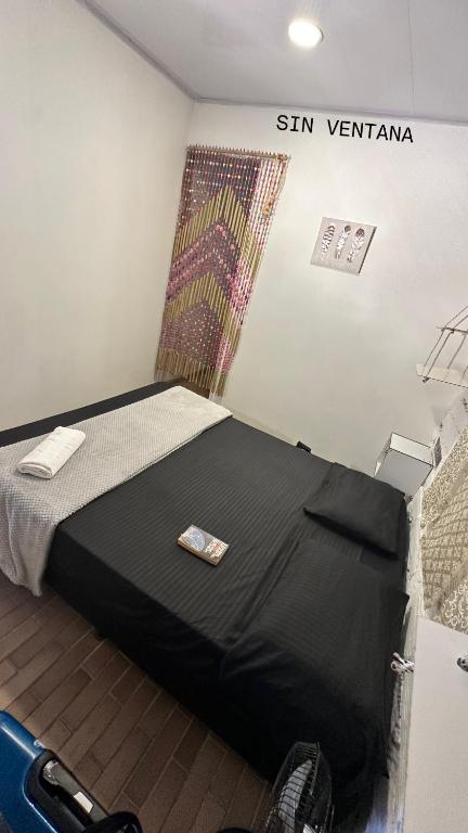 Postel nebo postele na pokoji v ubytování Casa Egos Pop Laureles