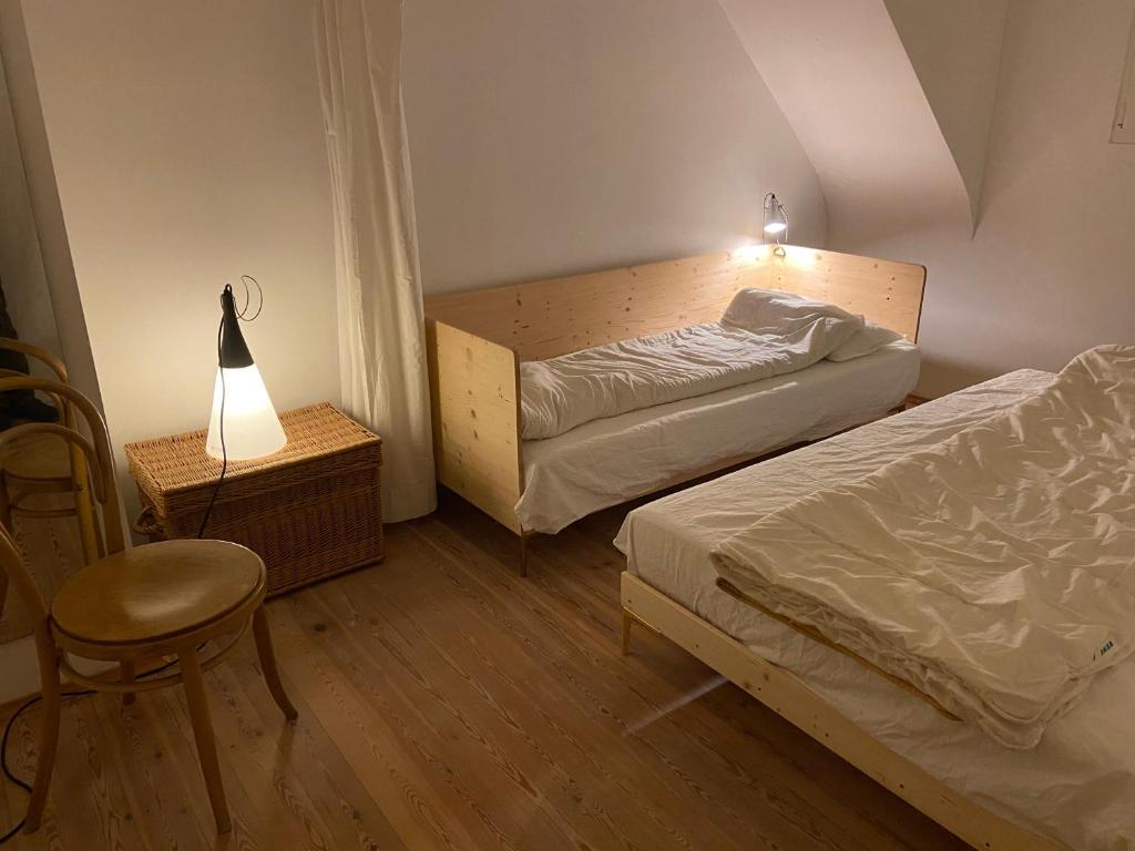 Postel nebo postele na pokoji v ubytování Ferienwohnung Kräutergarten