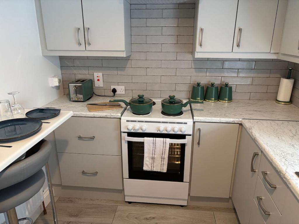 Kuchyň nebo kuchyňský kout v ubytování Cahir Cosy Cottage