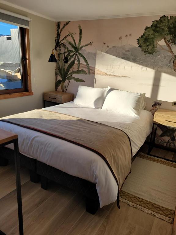 Postel nebo postele na pokoji v ubytování Mawün Hotel Pucón