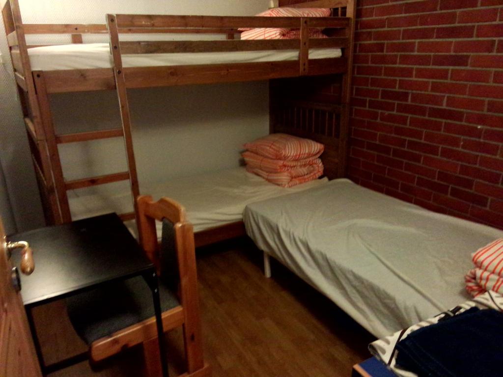 Postel nebo postele na pokoji v ubytování Gardenview Room
