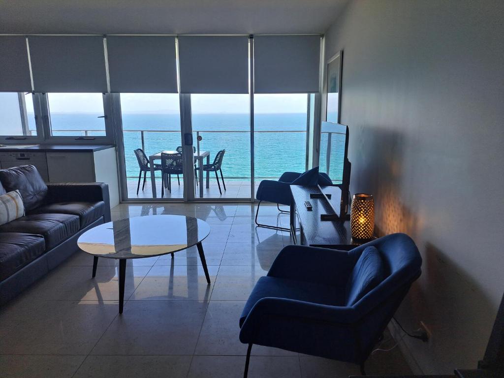 Posezení v ubytování Oshen Holiday Apartments Yeppoon